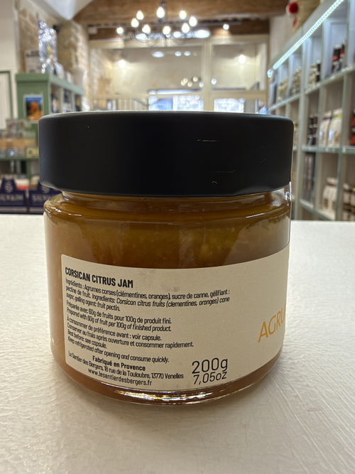 Photographie réelle de l'étiquette ingrédients, conservation et fabricant de la confiture d'agrumes corses 200 g